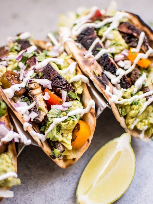 These vegetarian grilled portobello mushroom tacos are satisfying, healthy, TASTY, and make the perfect summer meal.