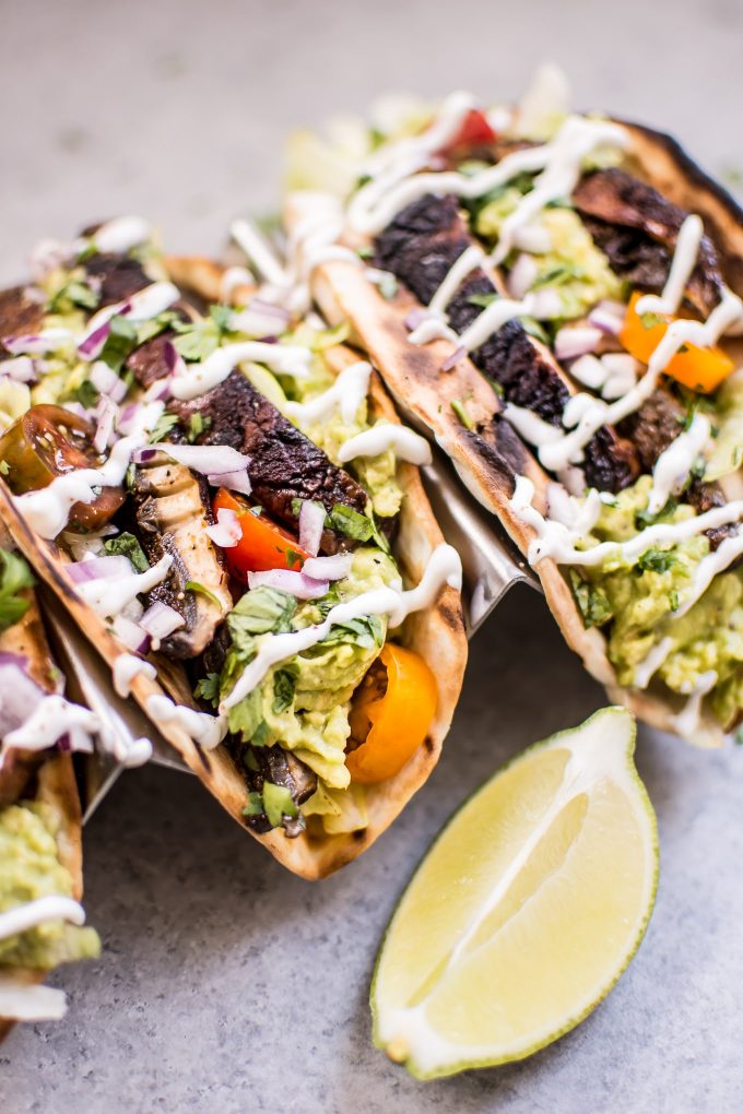 close-up of portobello mushroom tacos with lime wedge