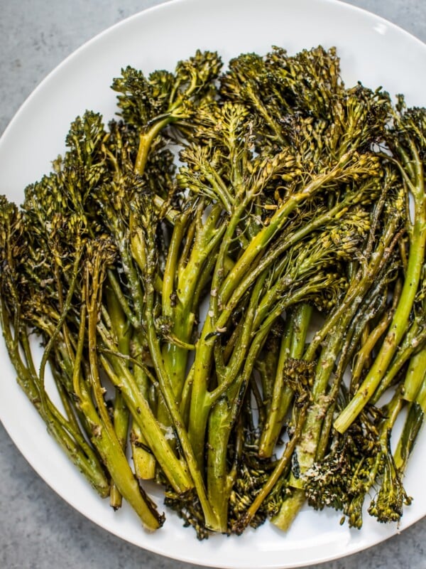 This balsamic parmesan roasted broccolini has the delicious flavors of parmesan cheese and balsamic vinegar. It only takes a few minutes to prepare and 15 minutes to cook.