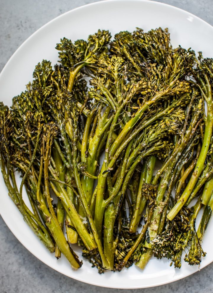 This balsamic parmesan roasted broccolini has the delicious flavors of parmesan cheese and balsamic vinegar. It only takes a few minutes to prepare and 15 minutes to cook.