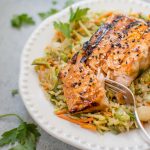 This sesame sriracha grilled salmon nourish bowl is a tasty, healthy, and convenient meal! Grilled honey garlic salmon is the perfect addition to this flavorful veggie and brown rice medley. #ad