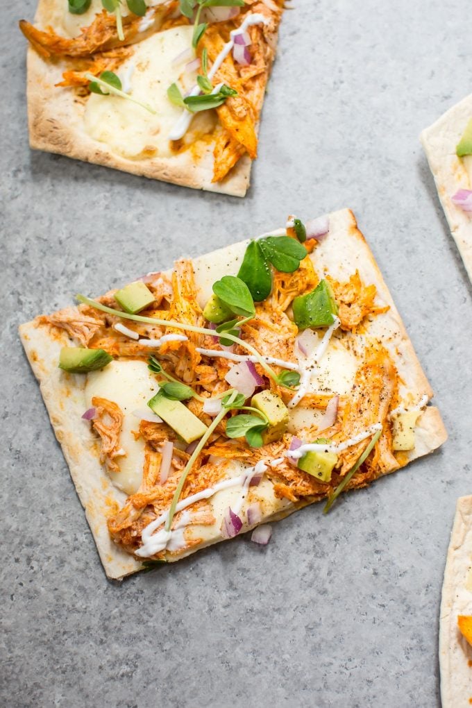 slice of skinny buffalo chicken flatbread pizza