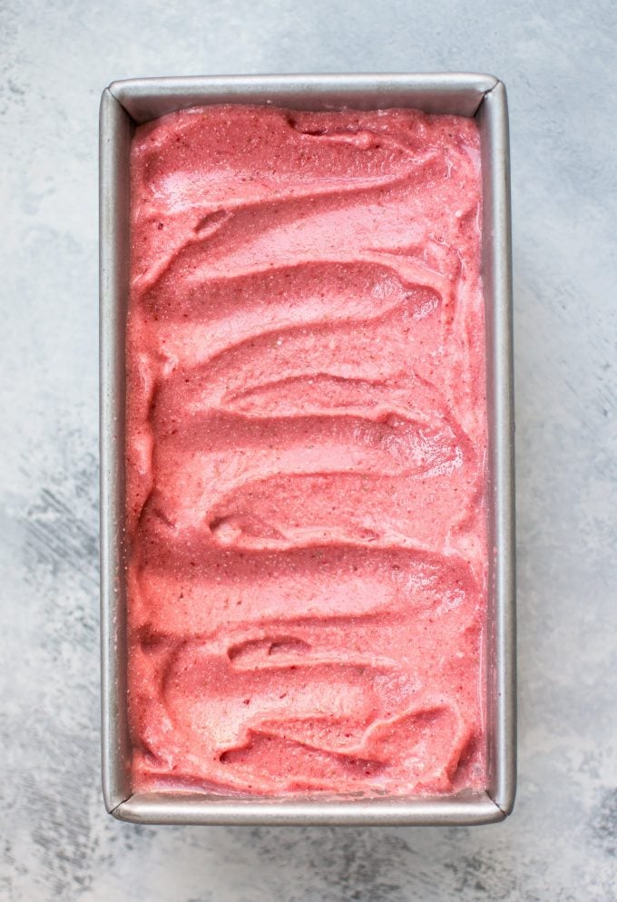metal container with vegan strawberry ice cream