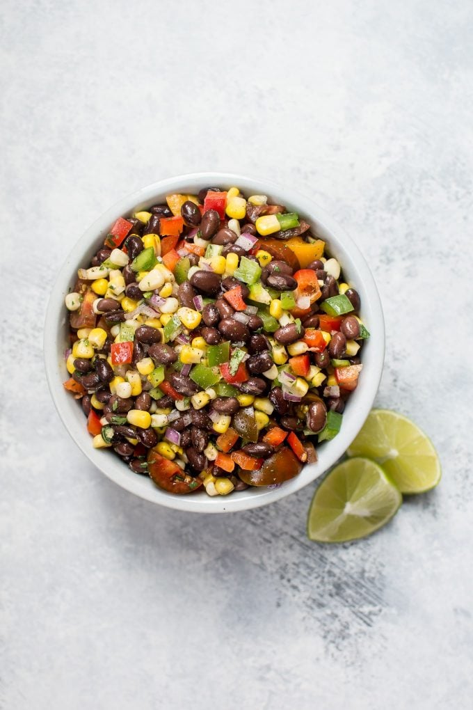 corn and black bean salad in white bowl close-up
