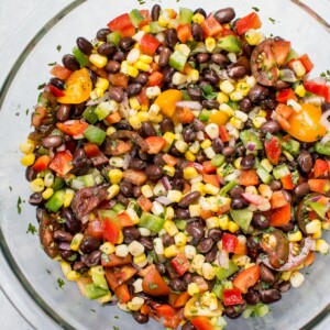 glass bowl with corn and black bean salad