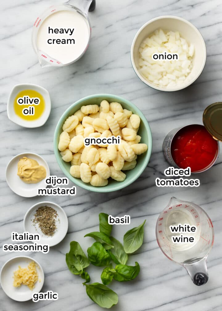 ingredients for creamy tomato gnocchi on a counter