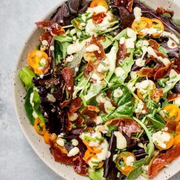 This mixed greens salad with crispy prosciutto is easy and fast to make, colorful, and bursting with flavor!