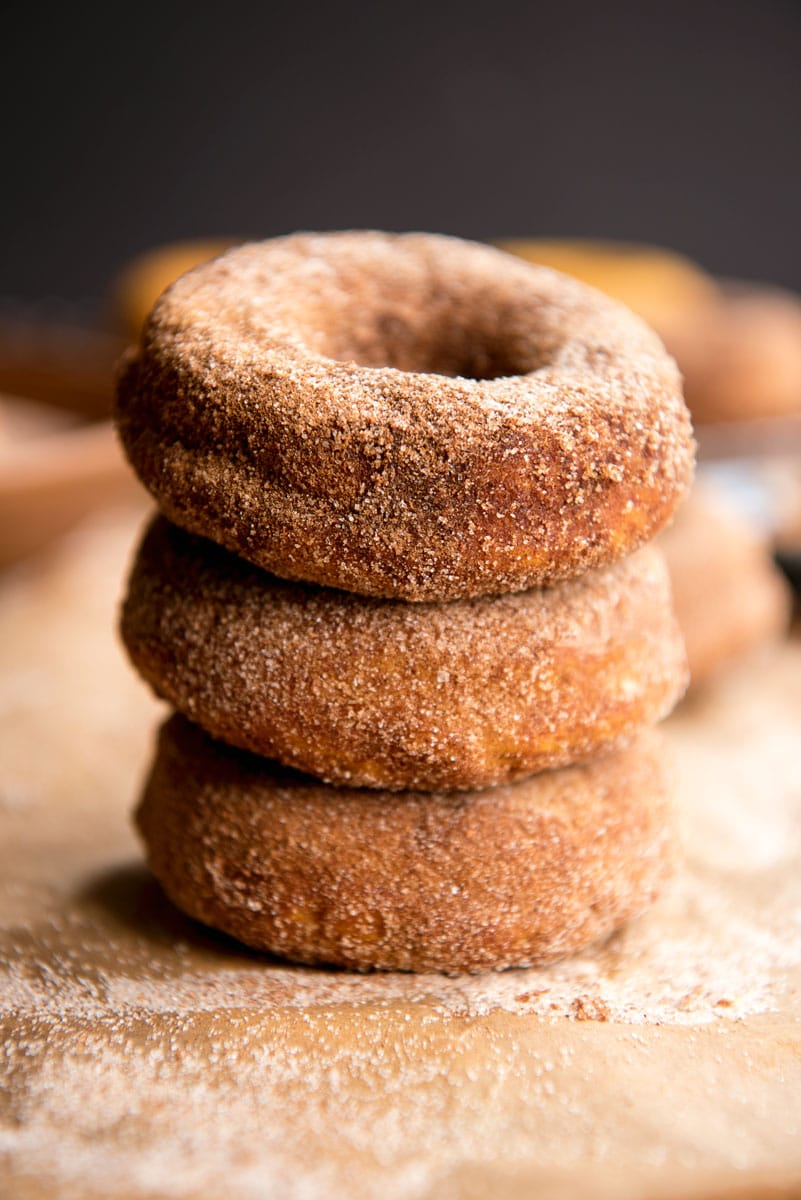 stack of three healthier baked pumpkin donuts