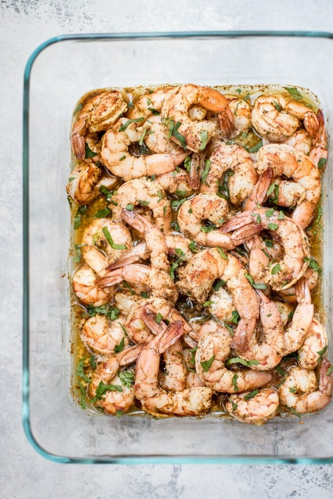 glass dish with baked chili lime shrimp