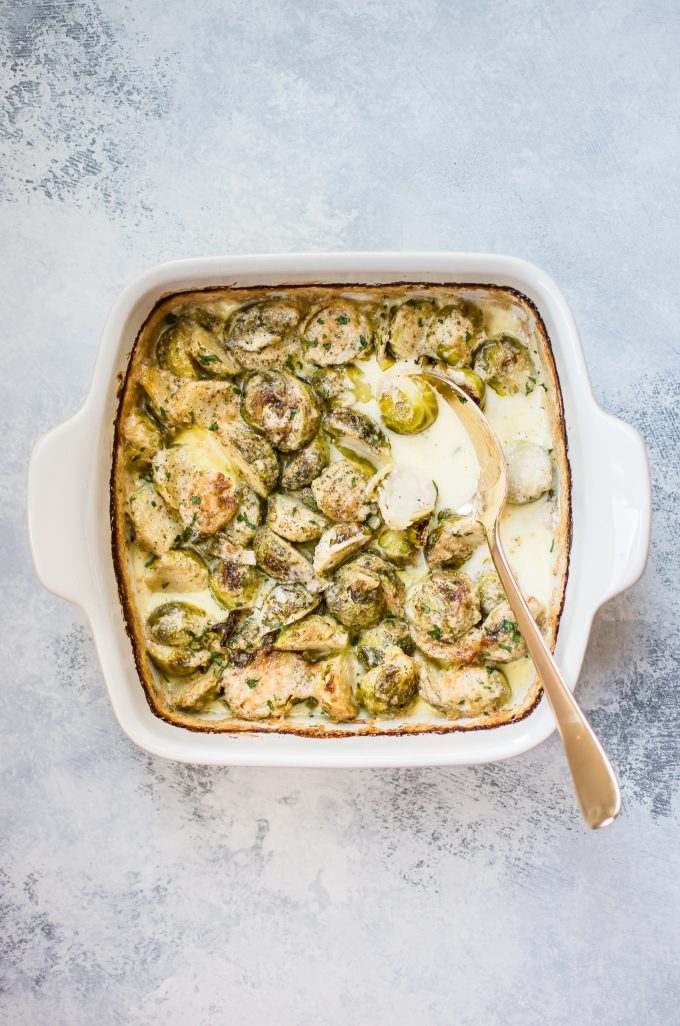 casserole dish with creamy baked Brussels sprouts