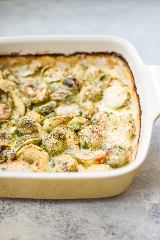 creamy baked Brussels sprouts in a baking dish