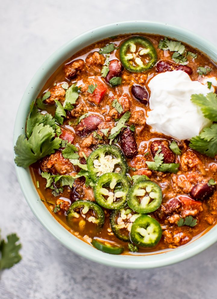 This easy crockpot turkey chili recipe is healthy, hearty, and comforting. A big batch will give you tons of tasty leftovers! 