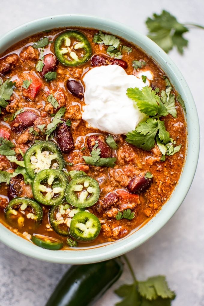 close-up of Crockpot turkey chili in a teal bowl