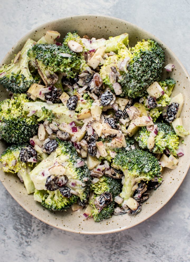 This healthy broccoli salad is a lightened-up version of your favorite! It's crunchy, tangy, sweet, and makes the perfect side dish.