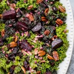 This kale and beet salad is a healthy vegetarian fall salad with dried cranberries, pecans, and a tangy balsamic vinaigrette dressing.