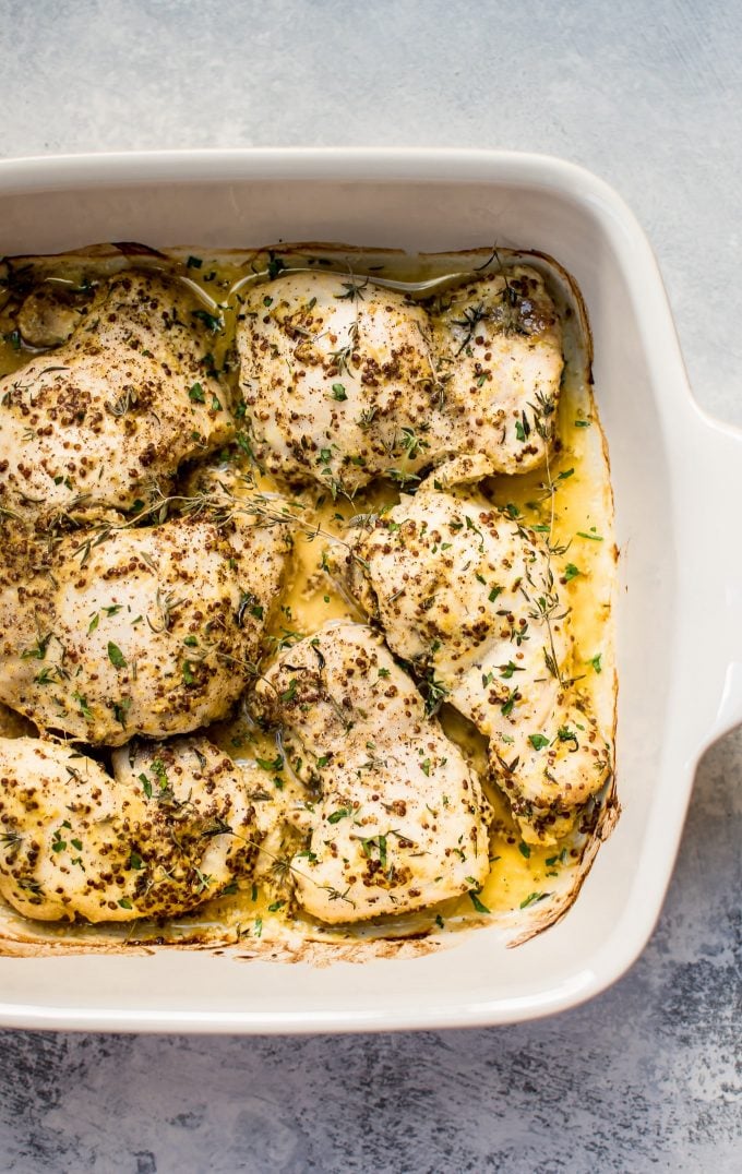 easy roasted mustard chicken thighs in a baking dish