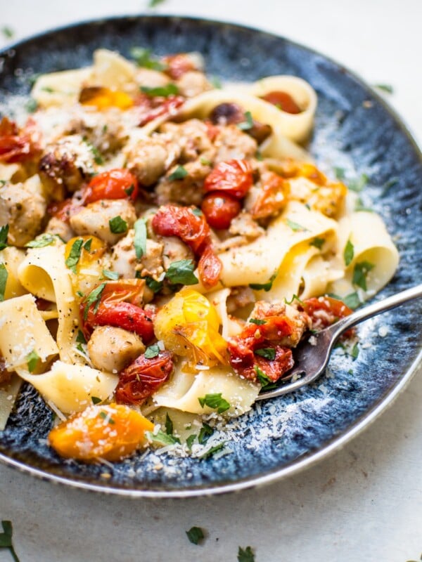 This roasted tomato and chicken sausage pasta is ridiculously easy and bursting with flavor. All you need is a few simple ingredients and your oven! 