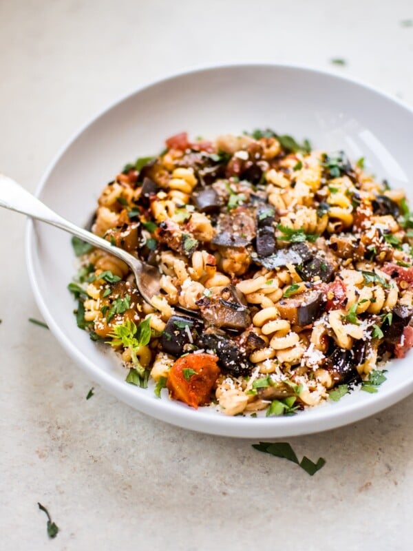 This spicy eggplant pasta recipe is a simple, healthy, and quick vegetarian pasta dish. It's ready in under half an hour - perfect for busy weeknights. 