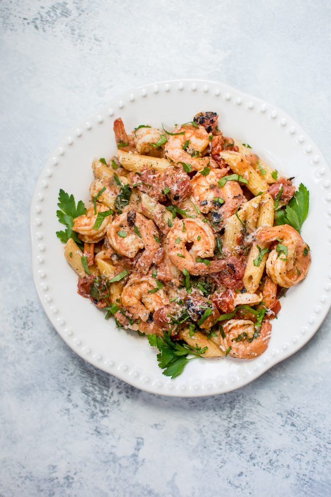 bowl of spicy shrimp penne with roasted tomato sauce