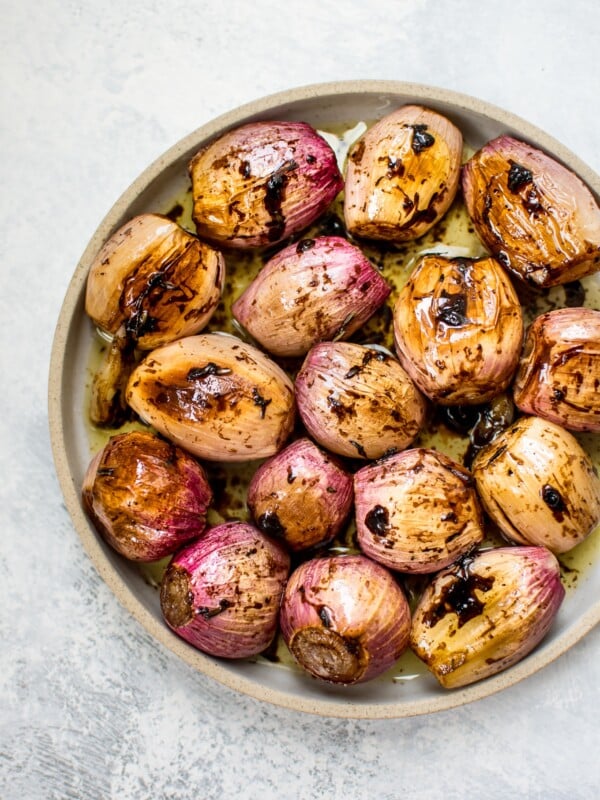 These whole roasted shallots make a tasty and beautiful addition to your dinner table! Balsamic vinegar and butter add an extra special touch to this easy vegetable side dish.