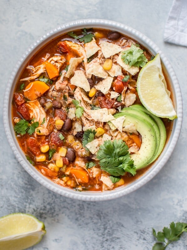 This Crockpot Mexican chicken soup is fresh, tangy, and comforting. Set it and forget it, and you'll come back home to a wonderful healthy homemade soup!