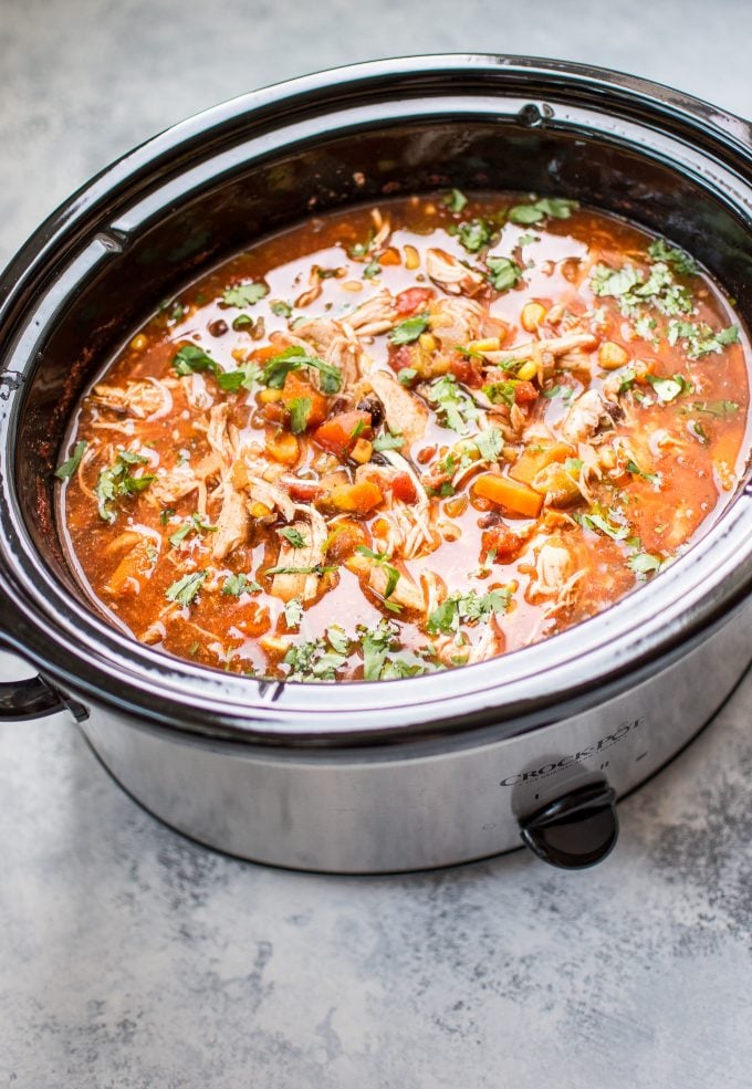 healthy Mexican chicken soup inside a slow cooker