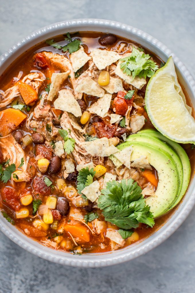 close-up of Mexican Crockpot chicken soup in a bowl
