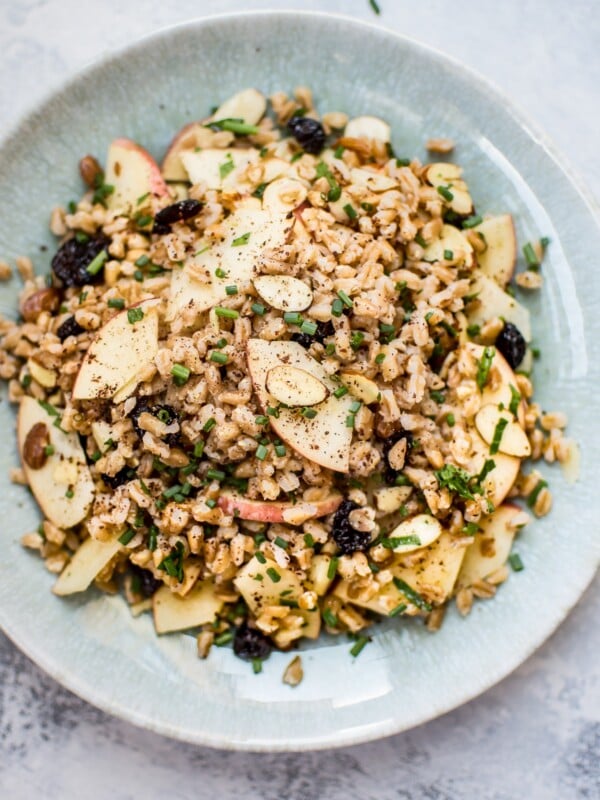 This healthy vegan farro salad is packed with dried cranberries, sliced almonds, honeycrisp apple slices, chives, and a lemon vinaigrette. It makes a wonderful light lunch or side dish.