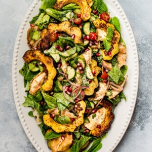 This fall fattoush salad recipe is fresh, bright, healthy, and given an autumn twist with roasted acorn squash. A beautiful addition to your dinner table!  