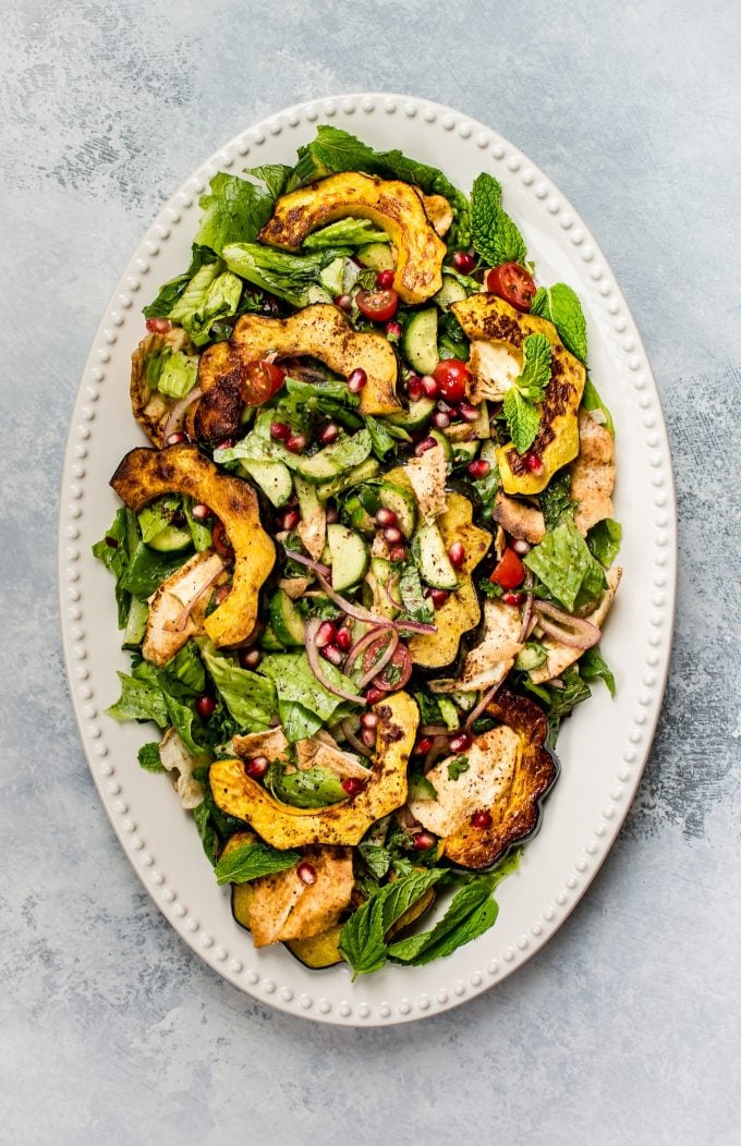 oval serving platter with fall fattoush salad with roasted acorn squash