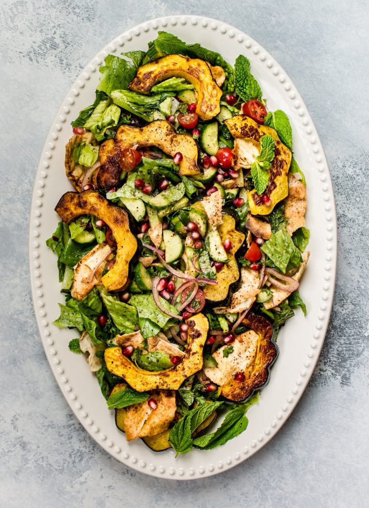 This fall fattoush salad recipe is fresh, bright, healthy, and given an autumn twist with roasted acorn squash. A beautiful addition to your dinner table!  
