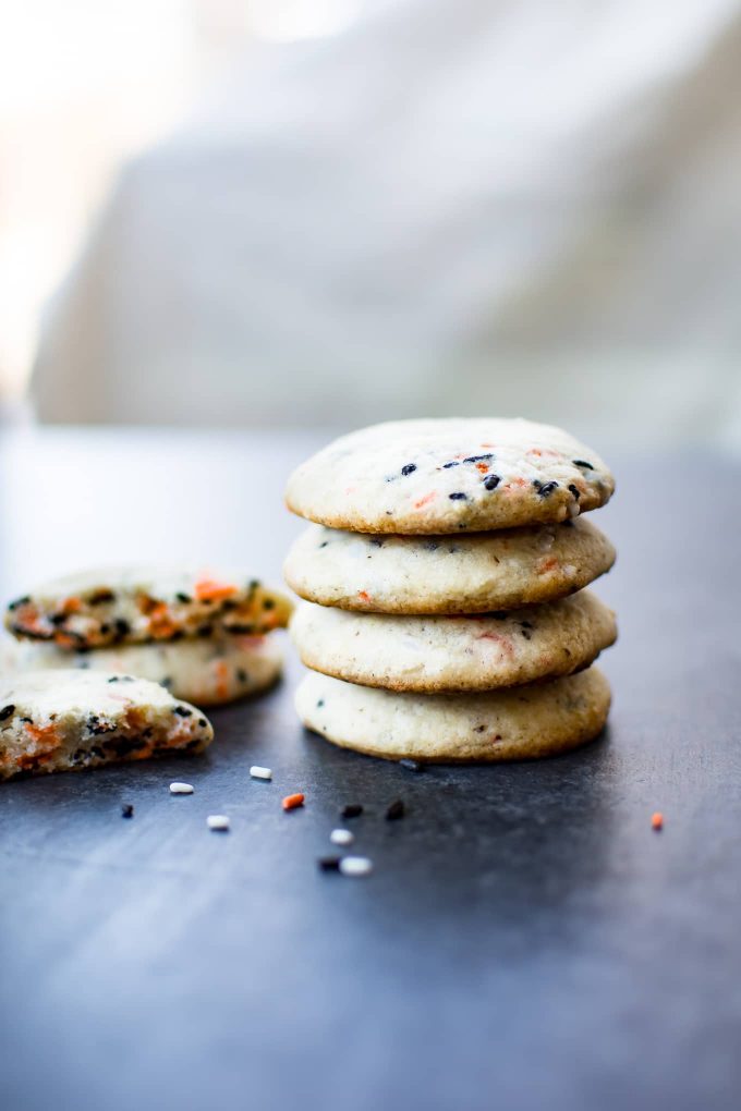 a stack of Halloween vegan sugar cookies on a table