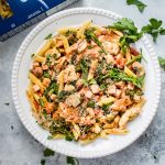 This lighter chicken and bacon pasta is made healthier with Canadian bacon, lean chicken breast, half-and-half, and fresh vegetables. Cajun spices and plenty of garlic take the flavor to the next level!