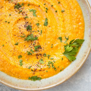 This vegan pumpkin and red lentil soup is hearty, healthy, and comforting. A delicious fall soup idea!
