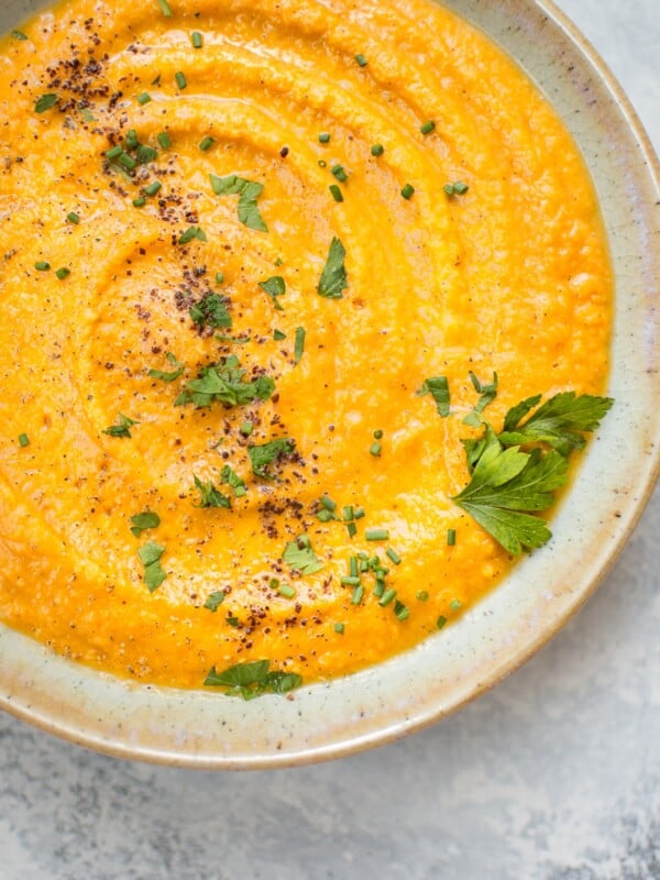 This vegan pumpkin and red lentil soup is hearty, healthy, and comforting. A delicious fall soup idea!