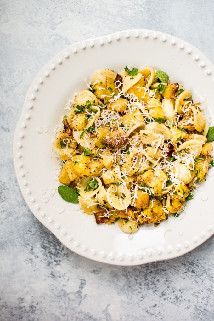 roasted butternut squash pasta with sage and brown butter sauce in a bowl