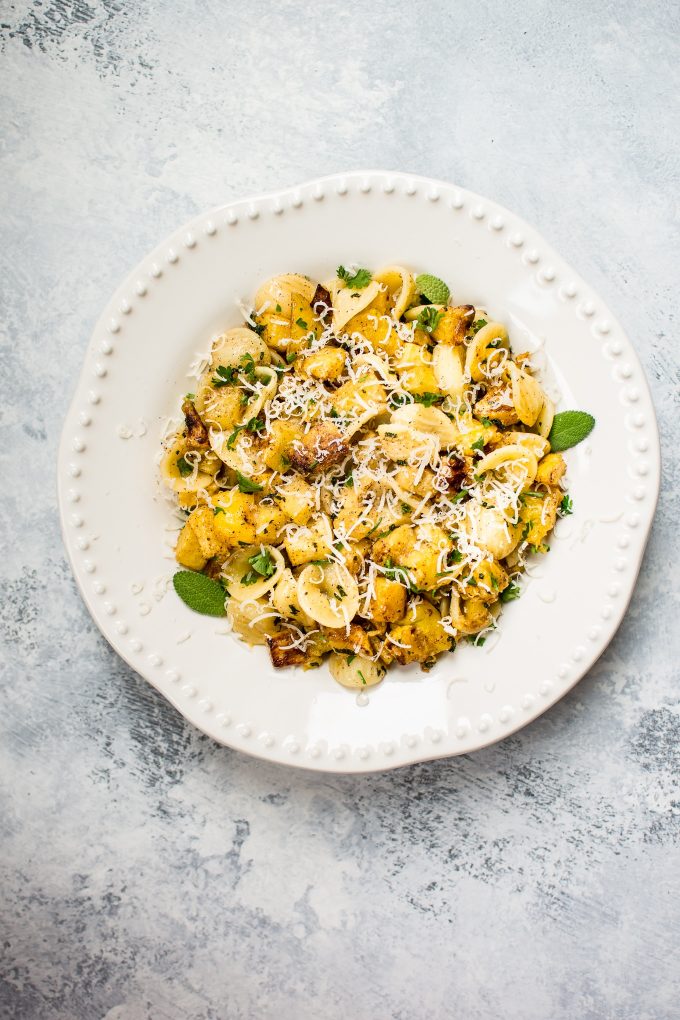 white bowl with roasted butternut squash pasta