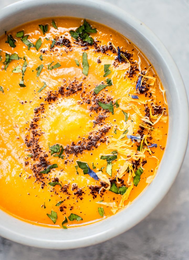 This spicy chipotle sweet potato soup is a healthy and flavorful vegan soup with a nice kick of heat! It's wonderfully silky and will really warm you up this fall.