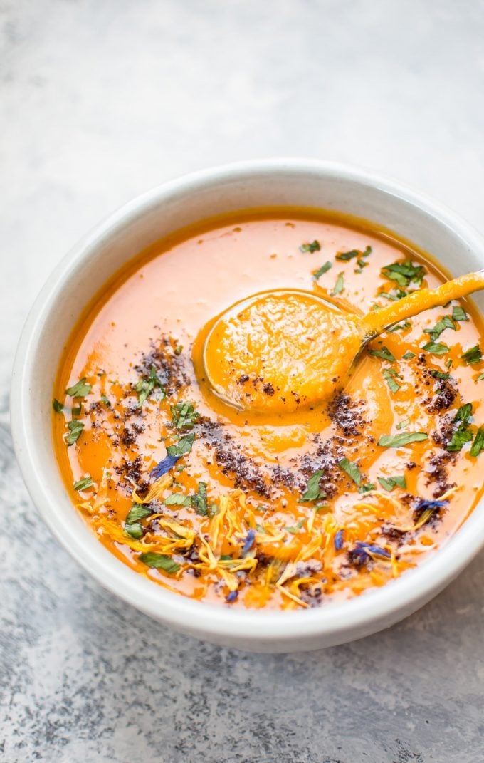 close-up of spicy chipotle sweet potato soup and spoon