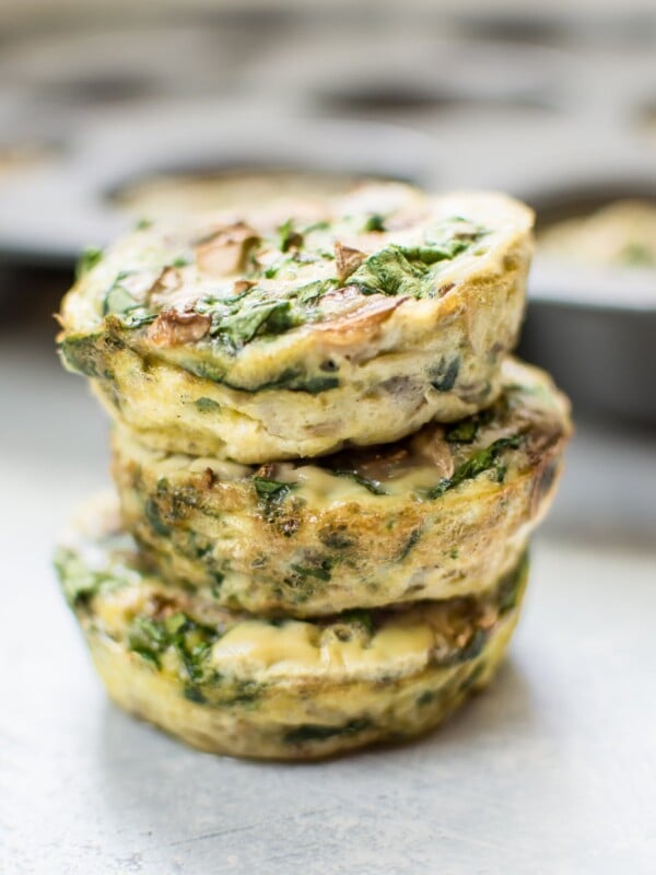 a stack of three spinach and mushroom egg muffins