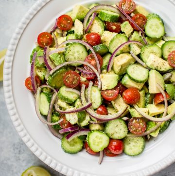 This easy cucumber tomato avocado salad is healthy, fresh, and bursting with flavor. It comes together fast and uses everyday ingredients. 