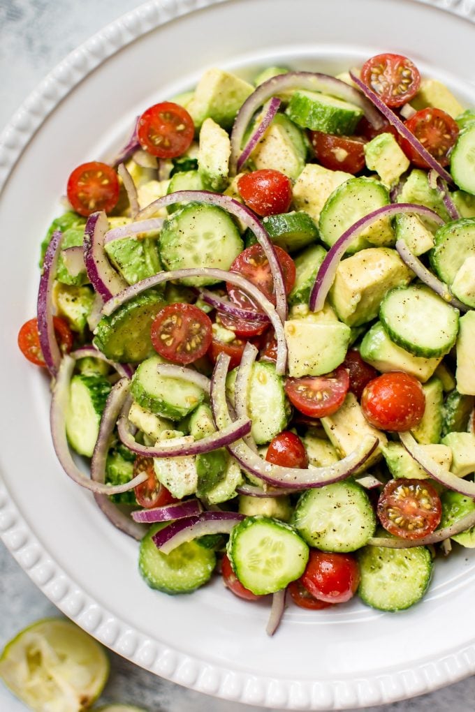 This easy cucumber tomato avocado salad is healthy, fresh, and bursting with flavor. It comes together fast and uses everyday ingredients. 