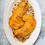 Honey cinnamon roasted hasselback butternut squash is a showstopping vegetarian side dish that would look perfect on your Thanksgiving table!