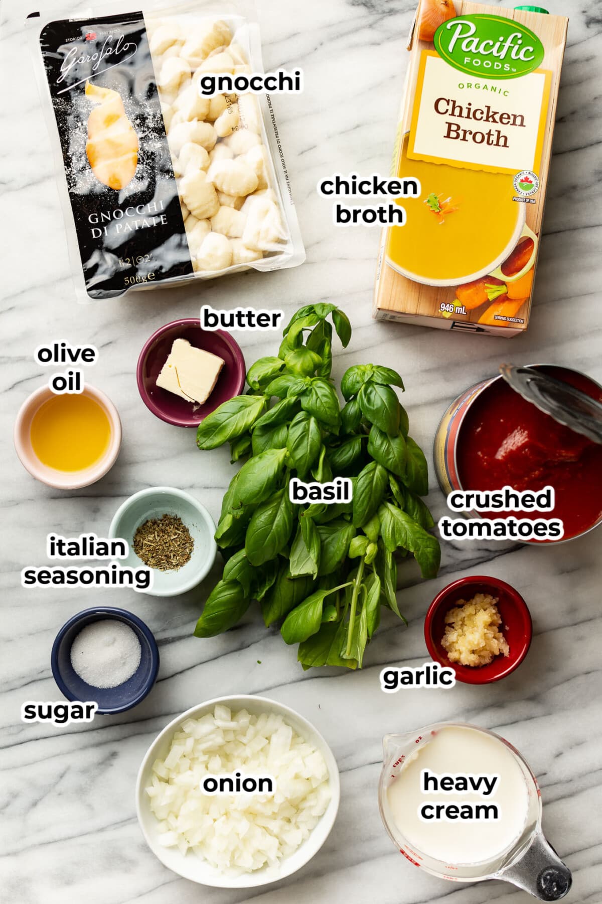 ingredients for tomato gnocchi soup in prep bowls