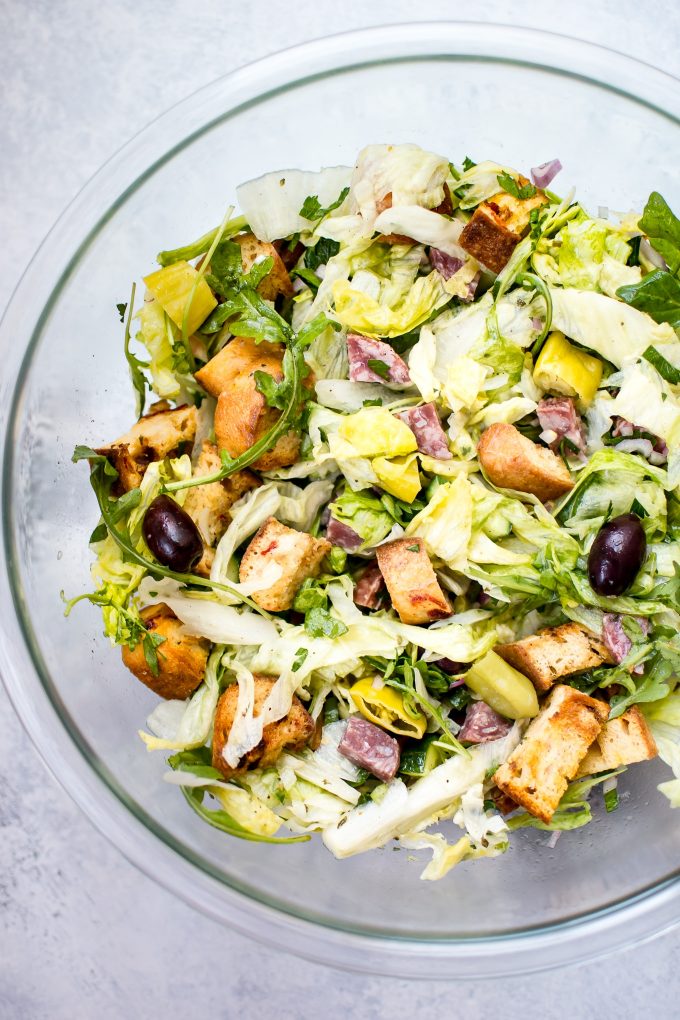 close-up of Italian chopped salad in glass bowl