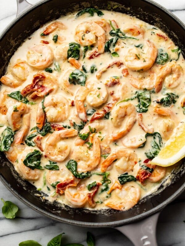 a cast iron skillet with creamy tuscan shrimp