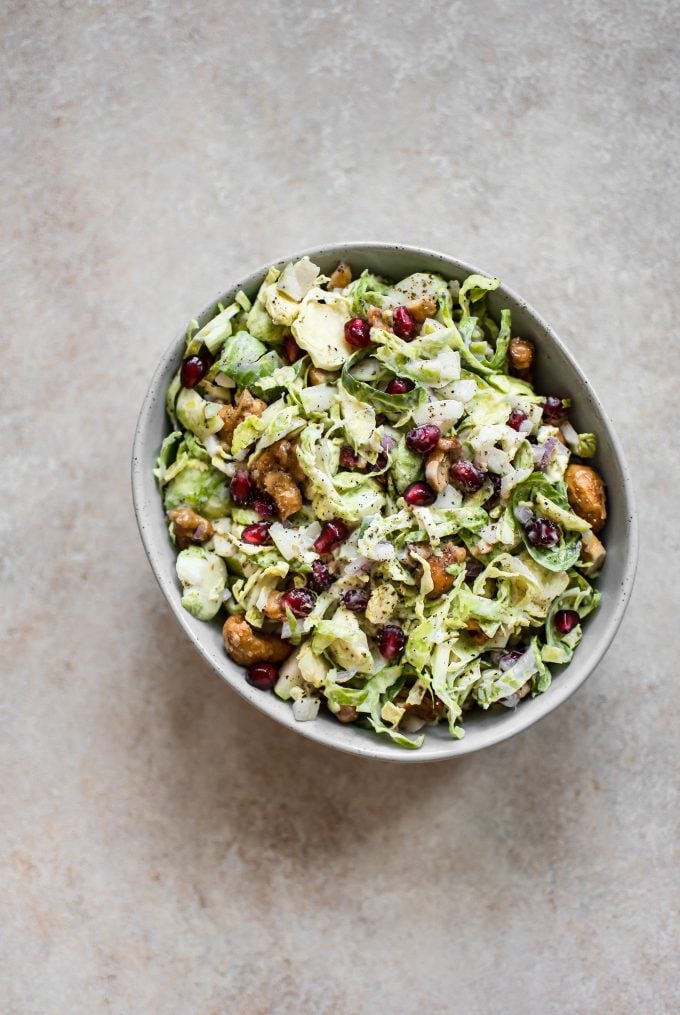bowl of winter slaw with Brussels sprouts and pomegranate