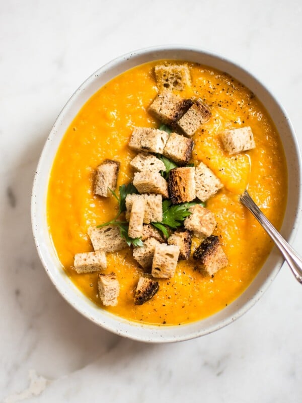 This butternut squash carrot soup recipe is healthy, simple, and has a great depth of flavor from the roasted vegetables! 