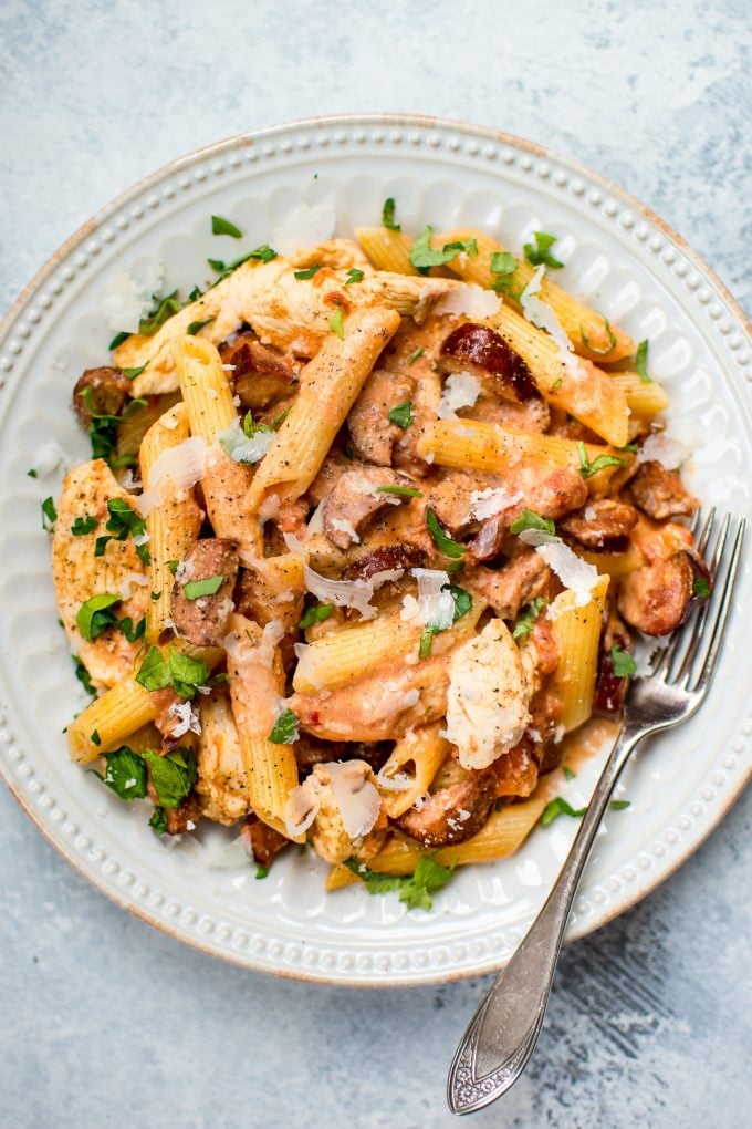 plate of chicken chorizo pasta with a fork