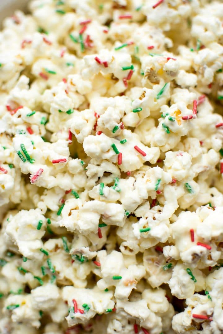 close-up of red and green sprinkles on Christmas popcorn